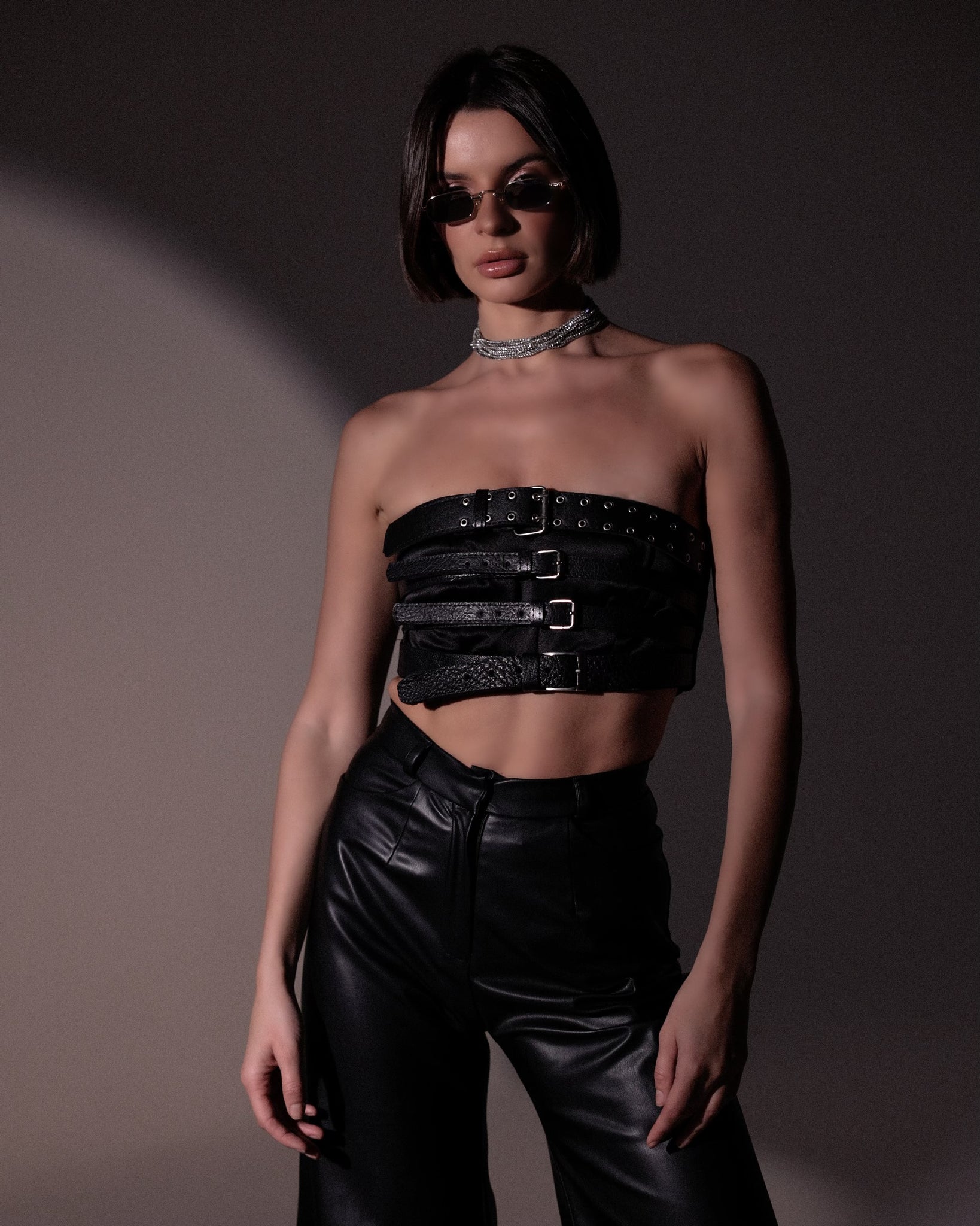 Belted top & Leather Flair Black Pants.